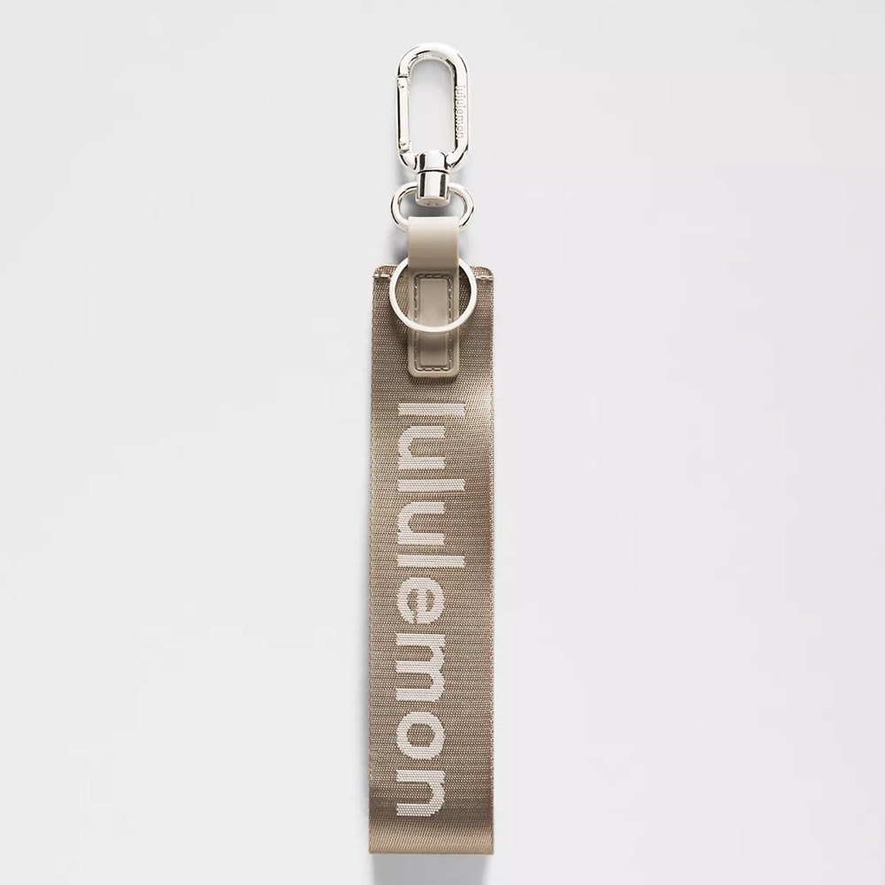 NWT Lululemon NEVER LOST KEYCHAIN Warm Ash Grey/Lt Ivory WSHG/LTIV -OOS ONLINE!